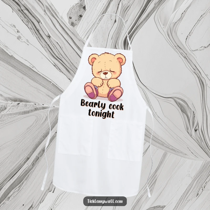 Funny apron depicting a sleepy teddy bear adorably wearing shoes on its paws, ideal for humorous and cute kitchen tasks.