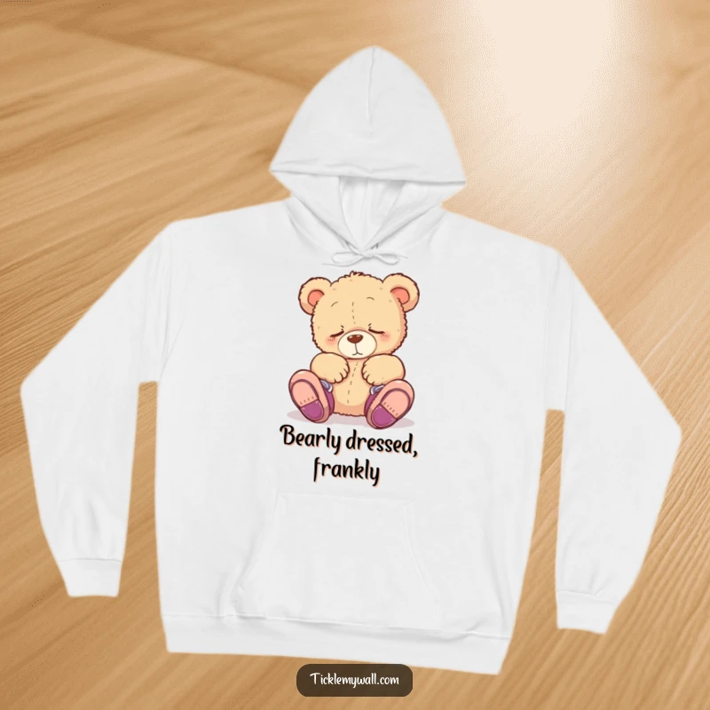 Funny hoodie showcasing a sleepy teddy bear hilariously sporting shoes on its paws, perfect for cozy, humorous lounging.