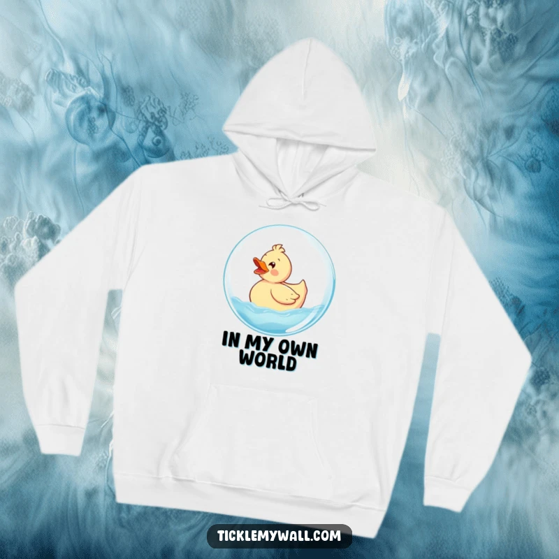 Funny Rubber Ducky Hoodie showing a delighted ducky comfortably riding a large bubble, perfect for cozying up with cheerful vibes.