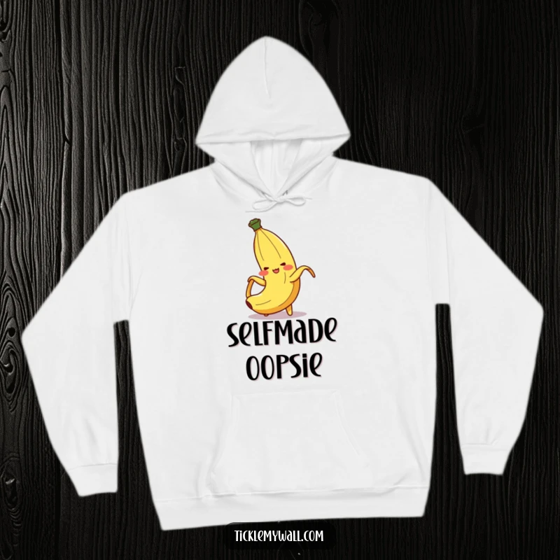 Funny Banana Peel Slip Hoodie: A blushing banana peel character in a comical, dramatic slip, perfect for cozy laughs.
