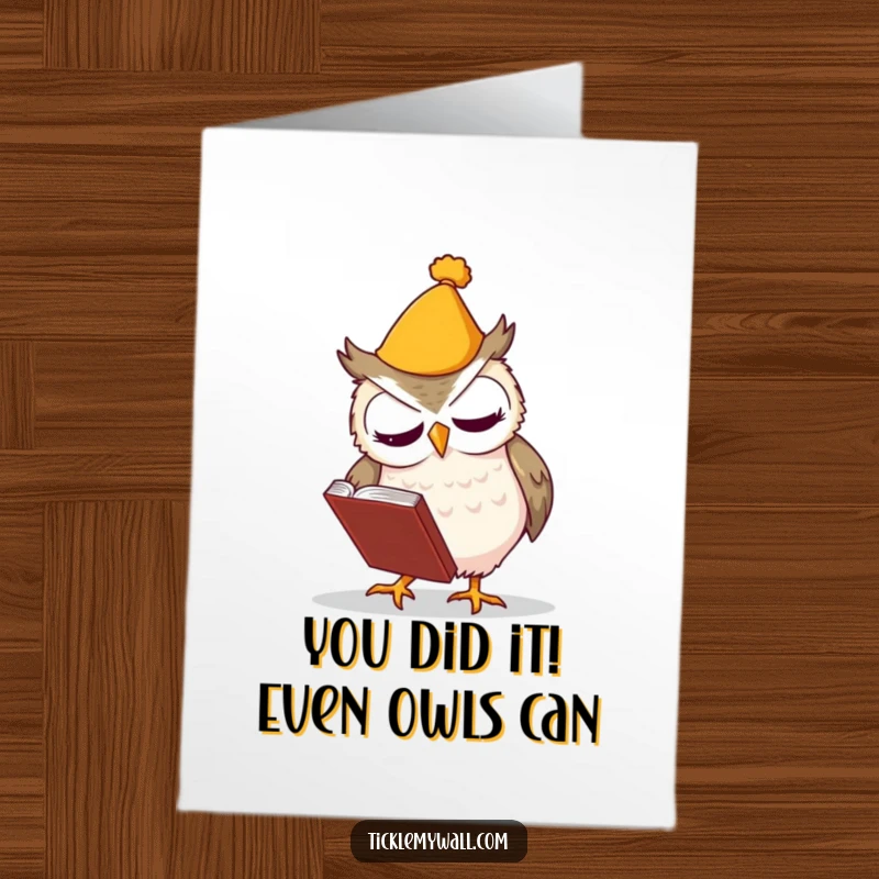Funny free printable congratulations card showing a clumsy owl fumbling a book, perfect for celebrating achievements with humor.