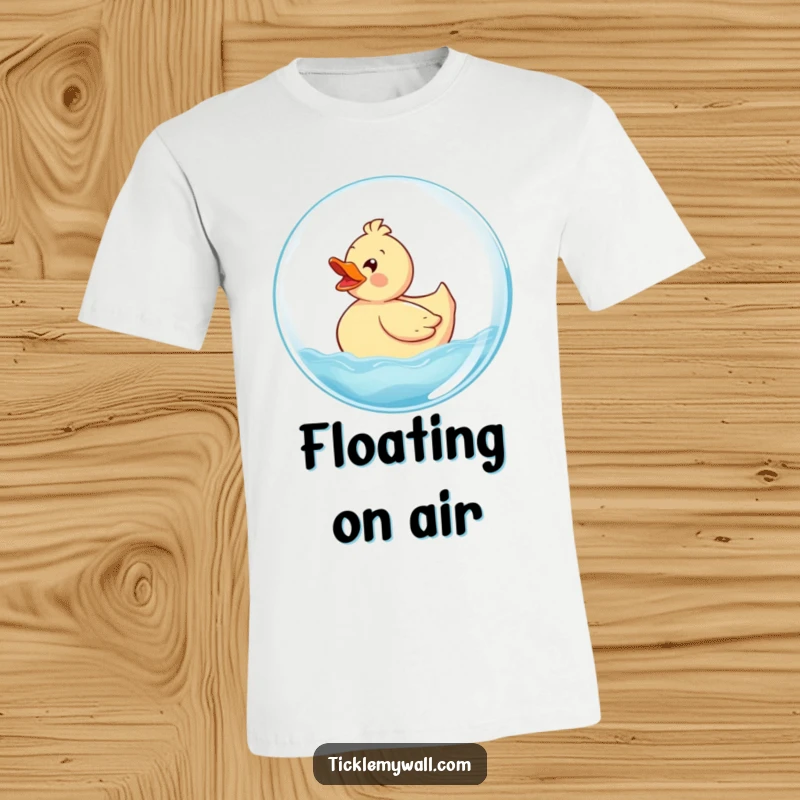 Funny Rubber Ducky T-Shirt featuring a delighted ducky blissfully riding a huge, translucent bubble, showcasing pure joy and playfulness.