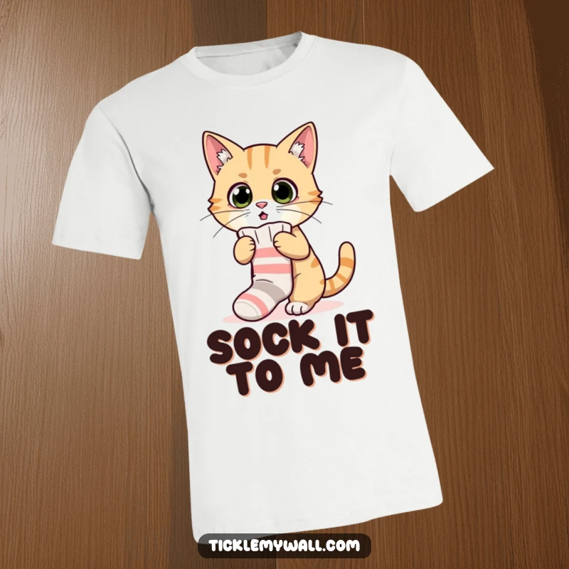 Funny t-shirt depicting a bewildered cat hilariously trying to put on a tiny sock, perfect for cat lovers' amusement.