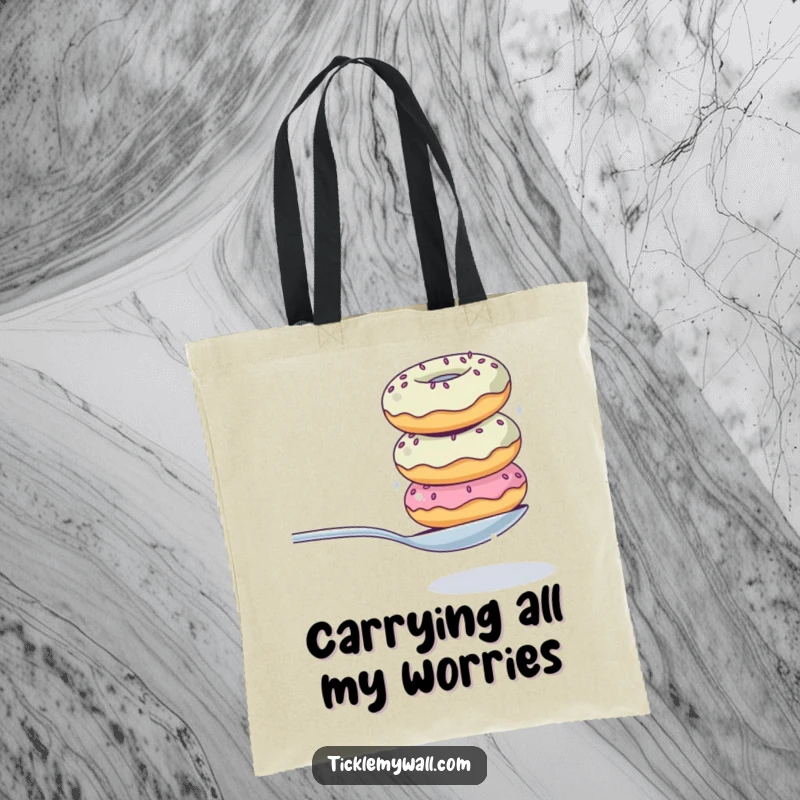Funny tote bag with a comical illustration of a wobbly donut stack struggling to balance a spoon, a humorous and practical accessory.
